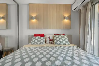 Un ou plusieurs lits dans un hébergement de l'établissement 11 MADRID - Splendid one-bedroom apartment near Croisette