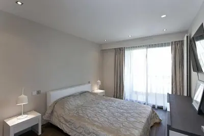 Un ou plusieurs lits dans un hébergement de l'établissement 2 chambres au cœur de Cannes - Croisette et plages à 1 min