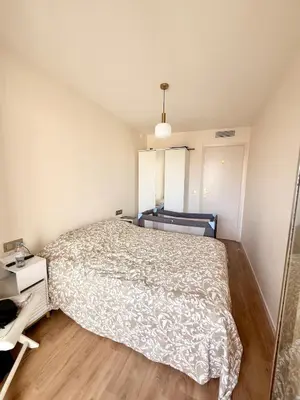 Un ou plusieurs lits dans un hébergement de l'établissement Elegance et Serenity Luxury apartment 50 m from the beach