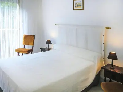 Un ou plusieurs lits dans un hébergement de l'établissement Apartment Les Jardins de l'Ermitage by Interhome