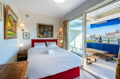 Un ou plusieurs lits dans un hébergement de l'établissement Appartement 3 pièces en dernier étage à proximité de la Croisette