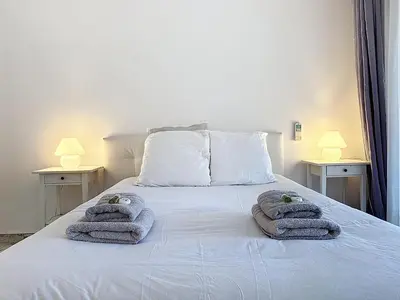 Un ou plusieurs lits dans un hébergement de l'établissement 47m2 - climatisation, carré d'or