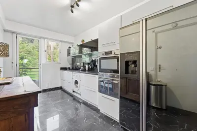 Cuisine ou kitchenette dans l'établissement La Rose des Vents - Cannes