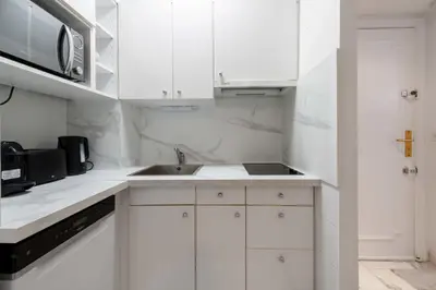 Cuisine ou kitchenette dans l'établissement 2P Proche Croisette et Centre Ville