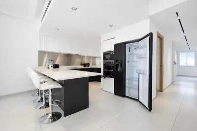 Cuisine ou kitchenette dans l'établissement Sable Croisette - Appartement de Luxe avec terrasse et vue Mer