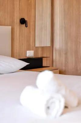 Un ou plusieurs lits dans un hébergement de l'établissement Prestige Croisette - Apartment with Panoramic Terrace and Sea View in Cannes