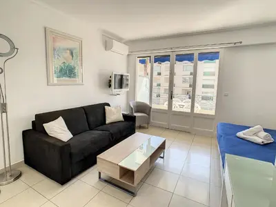Coin salon dans l'établissement Appartements Medicis