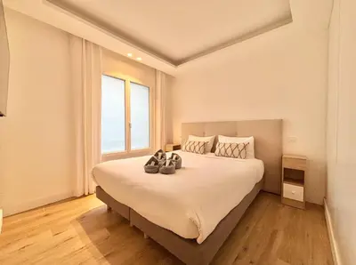 Un ou plusieurs lits dans un hébergement de l'établissement Cannes 2x2 bedrooms apartment - 24P3