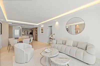 Coin salon dans l'établissement REF 2042 - Cannes Croisette - Appartement à louer