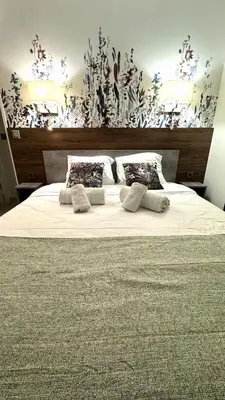 Un ou plusieurs lits dans un hébergement de l'établissement Penthouse vue mer avec Rooftop,Jacuzzi,et parking privé