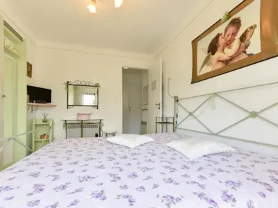 Un ou plusieurs lits dans un hébergement de l'établissement Apartment Boite d'Amour Wohnung mit Terrasse und Solarium by Interhome