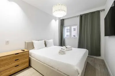 Un ou plusieurs lits dans un hébergement de l'établissement Luxury apt 5 min from the beach and La Croisette