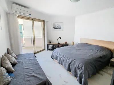 Un ou plusieurs lits dans un hébergement de l'établissement Appartements derrière Croisette