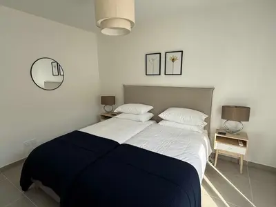 Un ou plusieurs lits dans un hébergement de l'établissement Les Terrasses d'Antibes - 2BR Duplex with Terrace