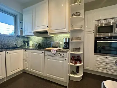 Cuisine ou kitchenette dans l'établissement Appart 2P à Villeneuve: Clim, 4 couchages - FR-1-252A-140