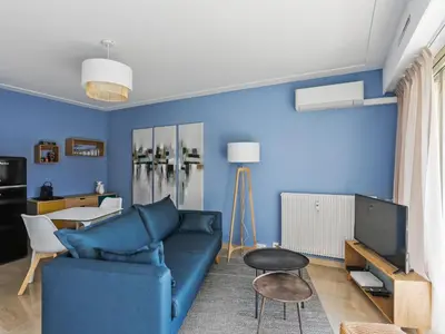 Coin salon dans l'établissement Superbe appartement avec terrasse et parking Antibes
