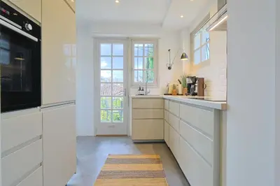 Cuisine ou kitchenette dans l'établissement 221 Le Bella