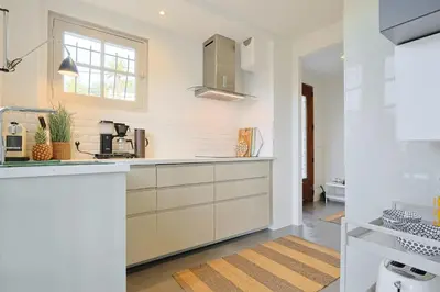 Cuisine ou kitchenette dans l'établissement 221 Le Bella