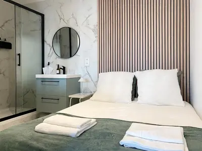 Un ou plusieurs lits dans un hébergement de l'établissement Appartement cosy au cœur de Biot