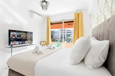 Un ou plusieurs lits dans un hébergement de l'établissement Lacour - 2 bedroom apartment - Large terrace - 2 min from the Croisette & beaches