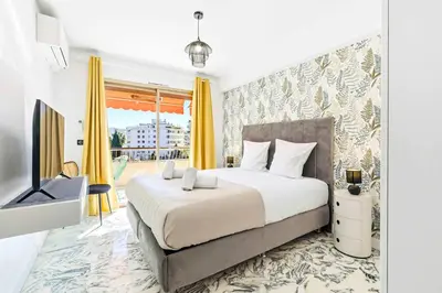 Un ou plusieurs lits dans un hébergement de l'établissement Lacour - 2 bedroom apartment - Large terrace - 2 min from the Croisette & beaches