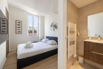 Un ou plusieurs lits dans un hébergement de l'établissement Modern Apartment a c 2CH 4P - Cannes