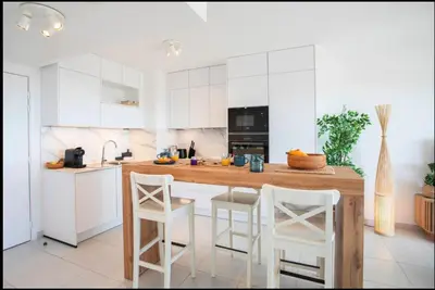 Cuisine ou kitchenette dans l'établissement A14 Staywiz us - 2P Vue Mer - 5 min de la Plage - Parking