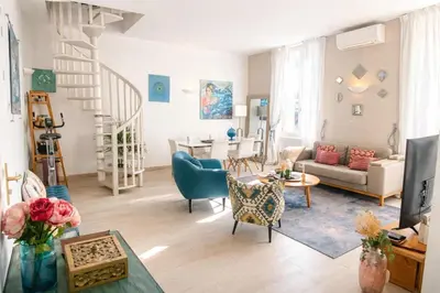 Coin salon dans l'établissement Cozystay 1825 Duplex luxe Rue dAntibes