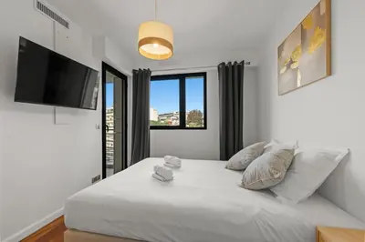 Un ou plusieurs lits dans un hébergement de l'établissement Sublime 2BR apartment Carlton Riviera Croisette