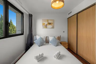 Un ou plusieurs lits dans un hébergement de l'établissement Sublime 2BR apartment Carlton Riviera Croisette