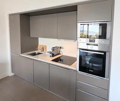 Cuisine ou kitchenette dans l'établissement Ref DUNES3 by Palmes d Or Properties