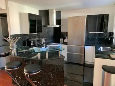 Cuisine ou kitchenette dans l'établissement Villa St Marc - Standing Presta