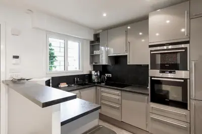 Cuisine ou kitchenette dans l'établissement Le Grain d'Or YourHostHelper