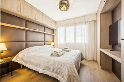 Un ou plusieurs lits dans un hébergement de l'établissement Magnifique appartement à 50 mètres de la Croisette