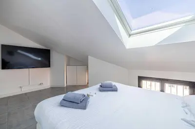 Un ou plusieurs lits dans un hébergement de l'établissement Luxury Penthouse 120mÂ² in the heart of Cannes