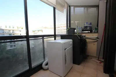 Cuisine ou kitchenette dans l'établissement PROCHE CARLTON One bedroom Apartment