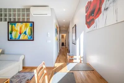 Coin salon dans l'établissement Two Bedrooms - 250m to the beach