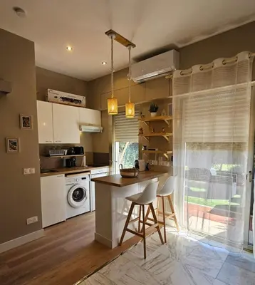 Cuisine ou kitchenette dans l'établissement Studio Lumineux avec Terrasse à Cannes