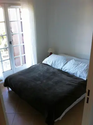 Un ou plusieurs lits dans un hébergement de l'établissement Comme une petite maison à la mer