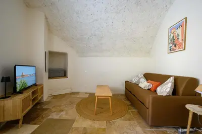 Télévision ou salle de divertissement dans l'établissement LX233 Studio voûté cœur du village - Charme absolu