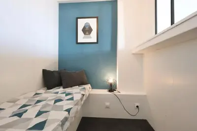 Un ou plusieurs lits dans un hébergement de l'établissement La Caravelle - Apt 2 Prs - front de mer - Clim