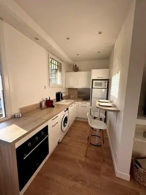 Cuisine ou kitchenette dans l'établissement Charmant Studio cagnes sur mer