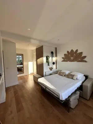 Un ou plusieurs lits dans un hébergement de l'établissement Charmant Studio cagnes sur mer
