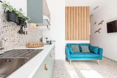 Cuisine ou kitchenette dans l'établissement La Maison Du Pêcheur