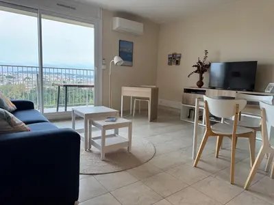 Coin salon dans l'établissement Chez Michèle - Apt 2 Prs - Sea View - Air Conditioning