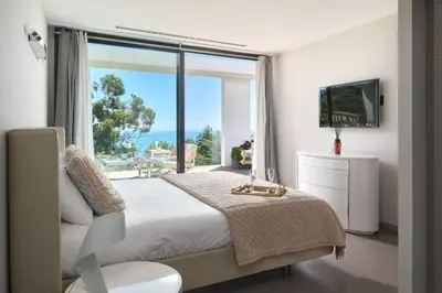 Un ou plusieurs lits dans un hébergement de l'établissement Villa Baie Des Iles