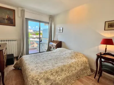 Un ou plusieurs lits dans un hébergement de l'établissement Méditerranée by Welcome to Cannes