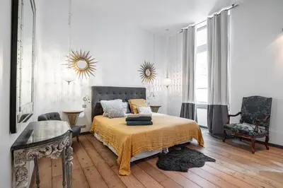 Un ou plusieurs lits dans un hébergement de l'établissement The Cosmopolitan Lodge