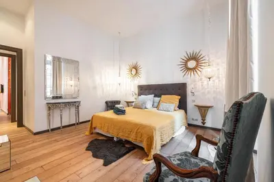 Un ou plusieurs lits dans un hébergement de l'établissement The Cosmopolitan Lodge