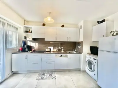 Cuisine ou kitchenette dans l'établissement Arènes by Welcome to Cannes